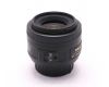 Объектив Nikon 35mm f/1.8G AF-S DX Nikkor в упаковке