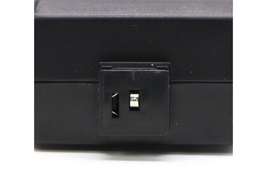 Черная фотовспышка Unomat B24 Auto в упаковке