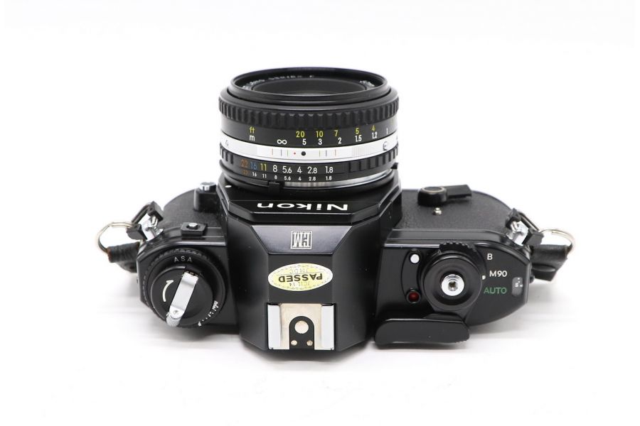 Фотокамера Nikon EM + Nikon 50mm f/1.8 (Japan, 1980)