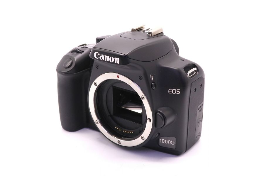 Фотокамера Canon EOS 1000D body (пробег 12900 кадров)