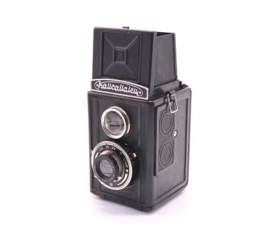 Советский зеркальный фотоаппарат Комсомолец