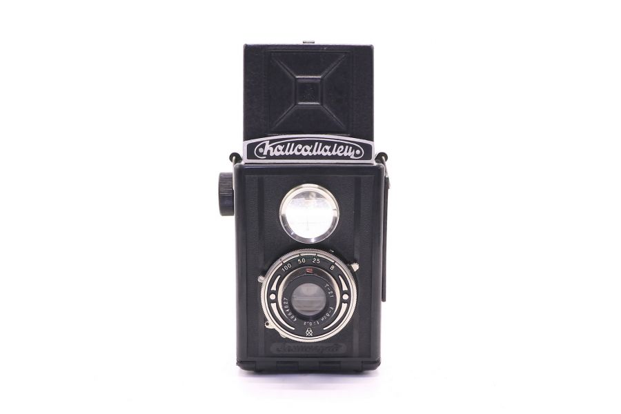 Советский зеркальный фотоаппарат Комсомолец