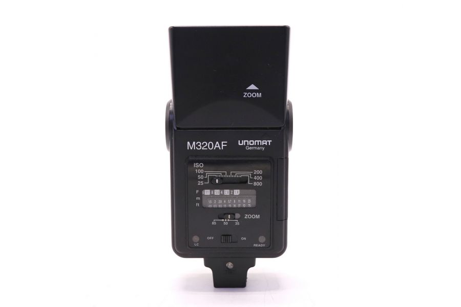 Фотовспышка Unomat M320AF в упаковке