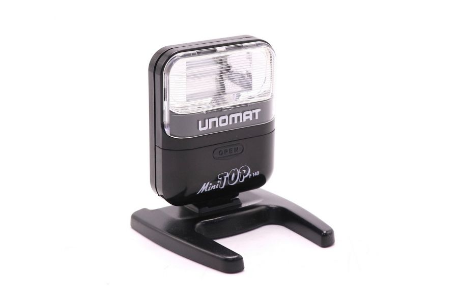 Фотовспышка Unomat Mini Top F140 в упаковке