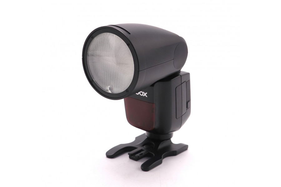 Фотовспышка Godox V1 C для камер Canon в упаковке