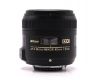Объектив Nikon 40mm f/2.8G AF-S DX micro Nikkor в упаковке