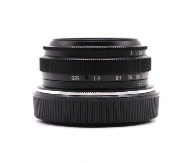 Объектив TTartisan 25mm f/2 APS-C для Canon EOS R в упаковке