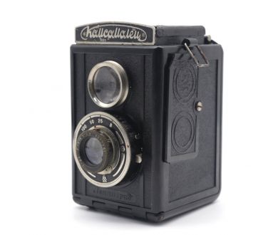 Зеркальный фотоаппарат Комсомолец (СССР, 1948г)