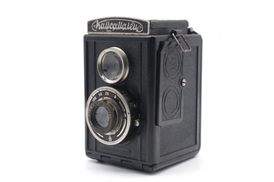 Зеркальный фотоаппарат Комсомолец (СССР, 1948г)