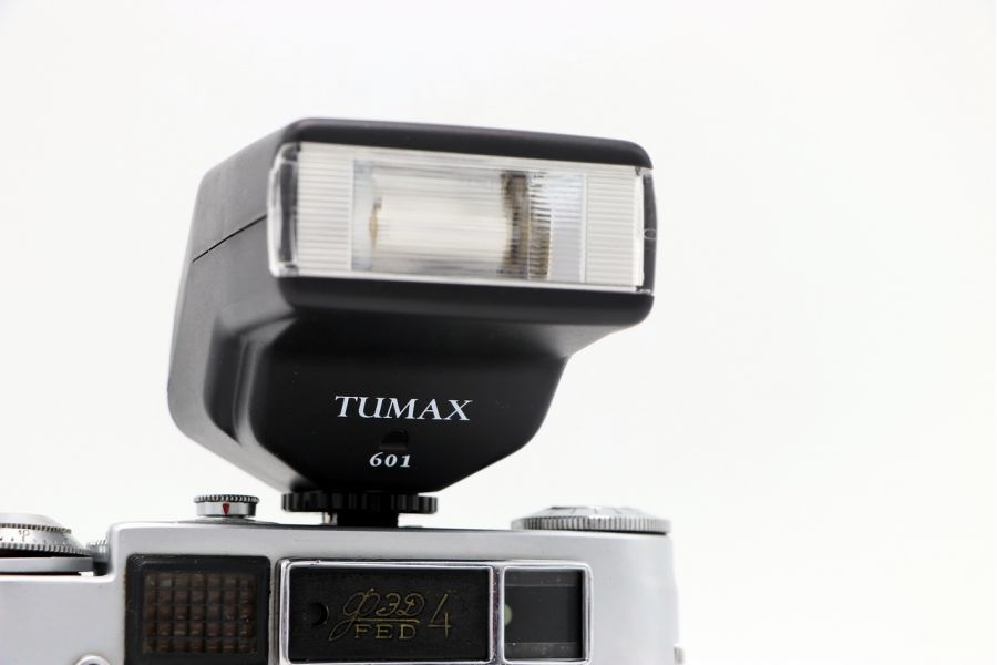Фотовспышка TUMAX manual 601