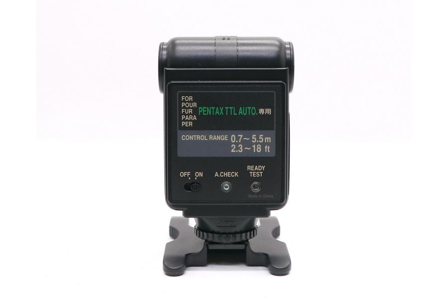 Фотовспышка Pentax AF220T в упаковке