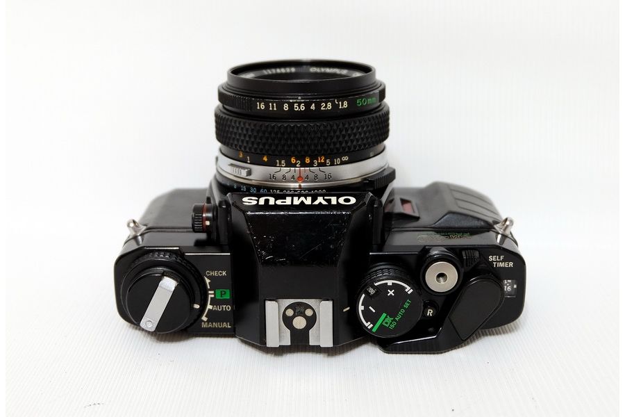 Olympus OM40 Program + Olympus OM-System F.Zuiko Auto-S 1:1,8/50mm